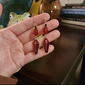 Coffin earrings with blood droplets